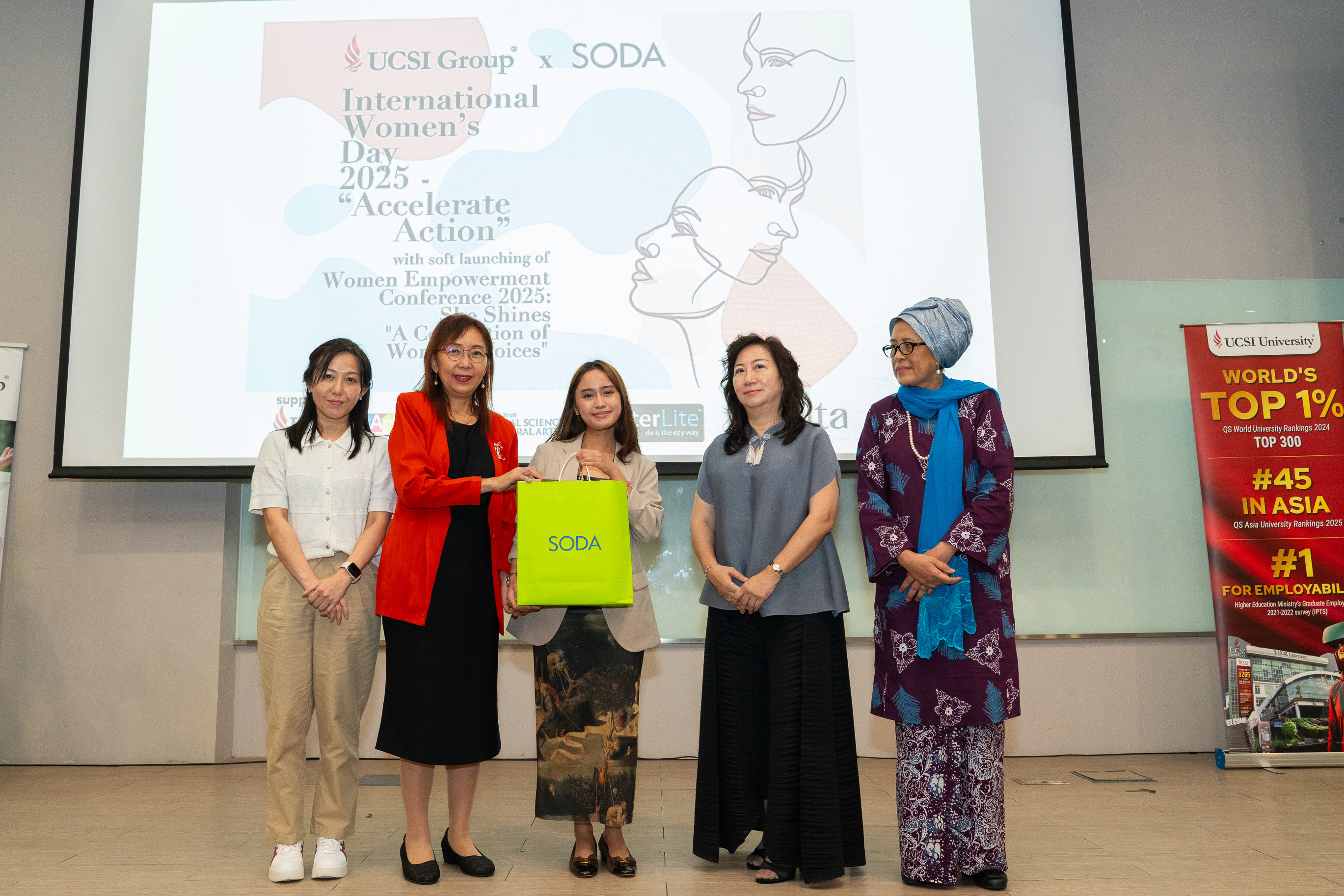 Aina Hadfina Khairulnizam (centre), one of the three winners of the SODA Upcycling T-Shirt Showcase, with (from left) SODA general manager Vivian Chew, Seputeh MP Teresa Kok, UCSI College Board of Governors Datin Lily Ng and UCSI University vice-chancellor and president Prof Emerita Datuk Dr Siti Hamisah Tapsir at UCSI University’s International Women’s Day 2025 celebration.