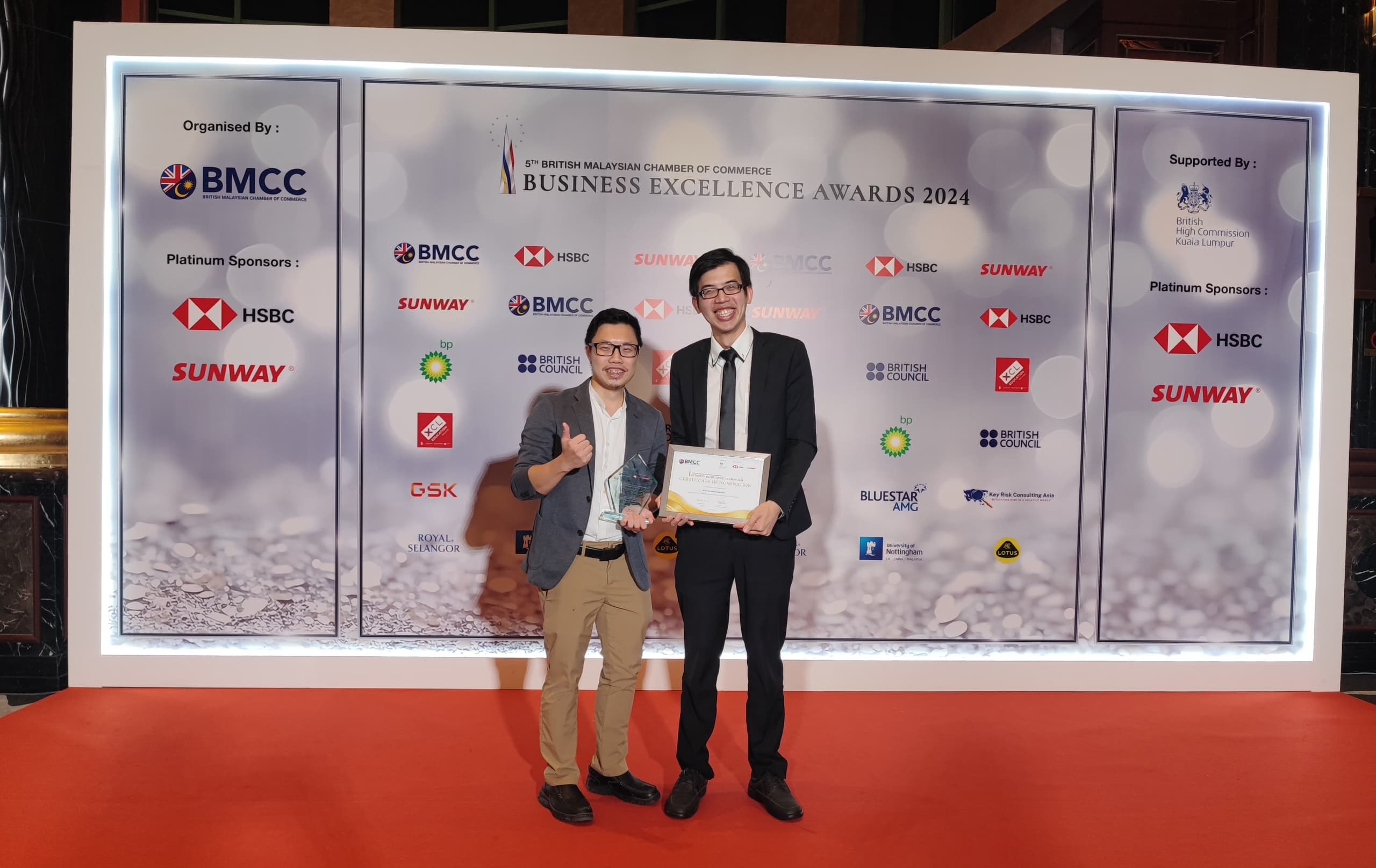 From left: Assoc Prof Eur Ing Ts Dr Yeap Swee Pin and Asst Prof Dr Teng Kah Hou proudly display their first runner-up trophy for the UK-Malaysia Education Institutional Partnership of the Year at the prestigious 5th British Malaysian Chamber of Commerce Business Excellence Awards 2024