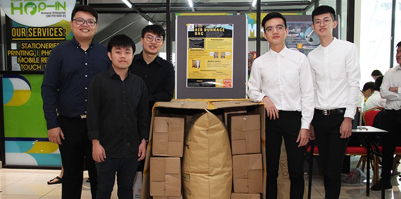 Group members with their project “The Air Dunnage Bag”.