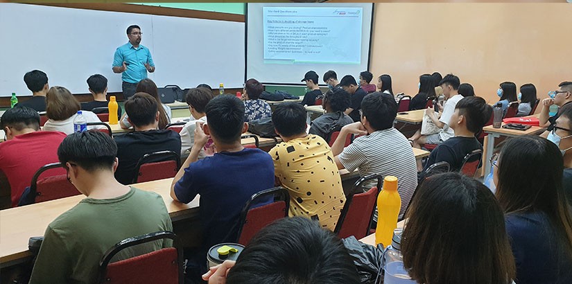 UCSI students listening attentively to the talk.