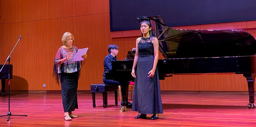 A one-to-one lesson by Professor Maria with one of the performers, Goh Xin Tian.