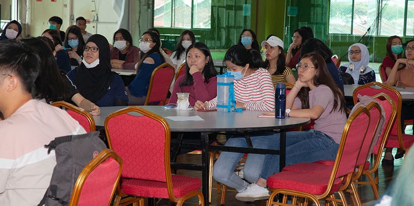 Students listening attentively to the talk.