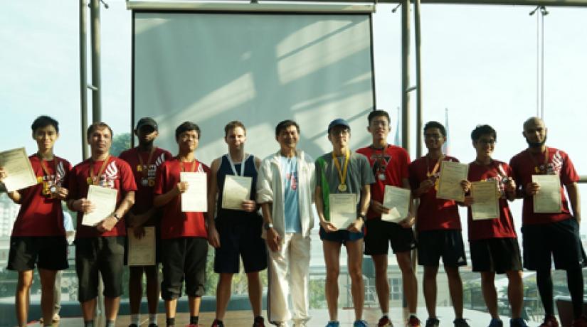  WINNERS: Asst Prof Sylvester Lim (in white) with the ABC Run Men’s category winners.