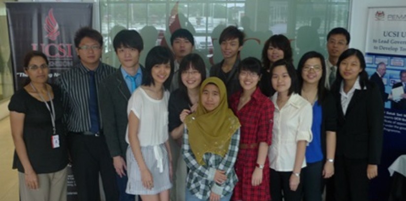 The A-Level students happily posing together after receiving their results.