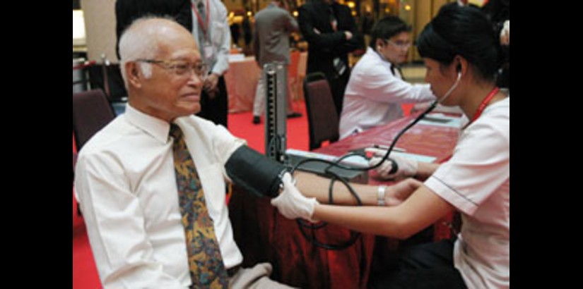 UCSI Chancellor having his blood preassure checked