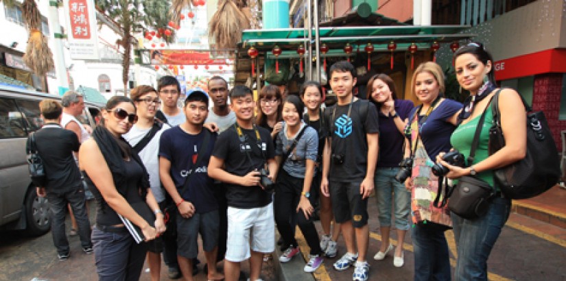 GROUP PORTRAIT: Architecture students in the midst of a site visit in Old KL for the heritage preservation project.