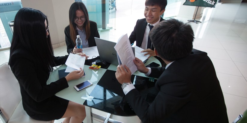 One of the teams preparing for their presentation.