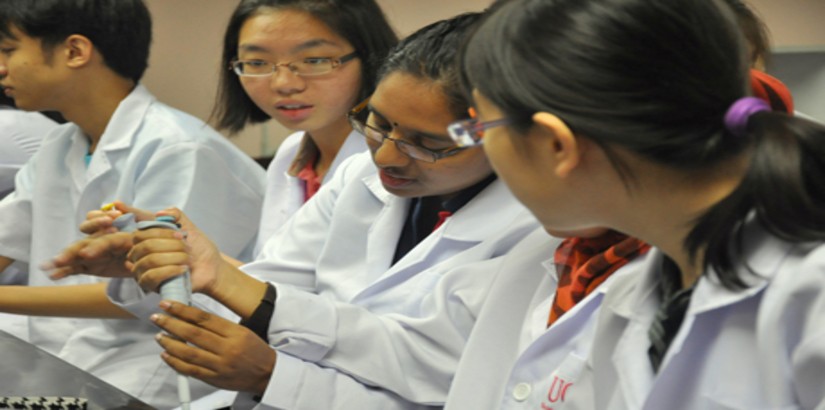  ENGAGING SESSION: Secondary school learners in the midst of conducting an experiment during UCSI University's "Putting U in CSI: The Junior CSI Agent" workshop last year.