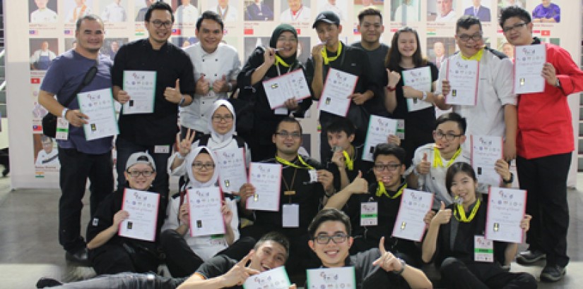 [CULINARY CHAMPS]: Chef lecturers and culinary arts students from Kuala Lumpur and Sarawak campus sharing a light moment at the competition.