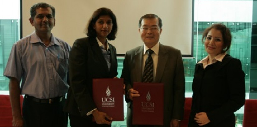 LANDMARK DEAL:(From left) CADD director Anandan Shanmugram,Rohini,Prof Lim and UCSI University's Faculty of Learning adn Teaching chairman Dr C.Eng Rozita Teymourzadeh strike a pose after the MoU signing ceremony.