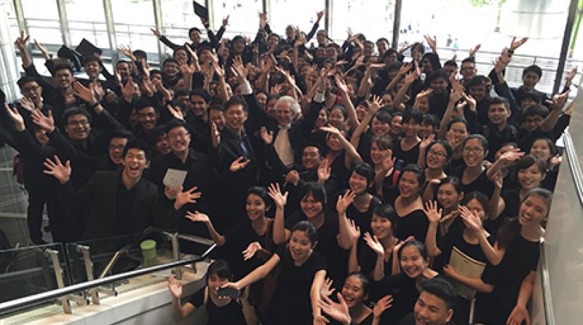  Members of the UCSI Chorale sharing a light moment with Zander (middle).