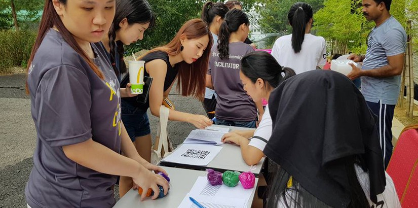 Students registering for the Colour Festival.
