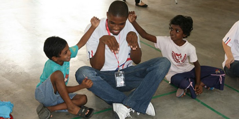 A UCSI University student volunteer plays games with children at the Desa Amal Jireh orphanage during the "Light Up Lives" charity event. A UCSI University student volunteer plays games with children at the Desa Amal Jireh orphanage during the "Light Up Lives" charity event.