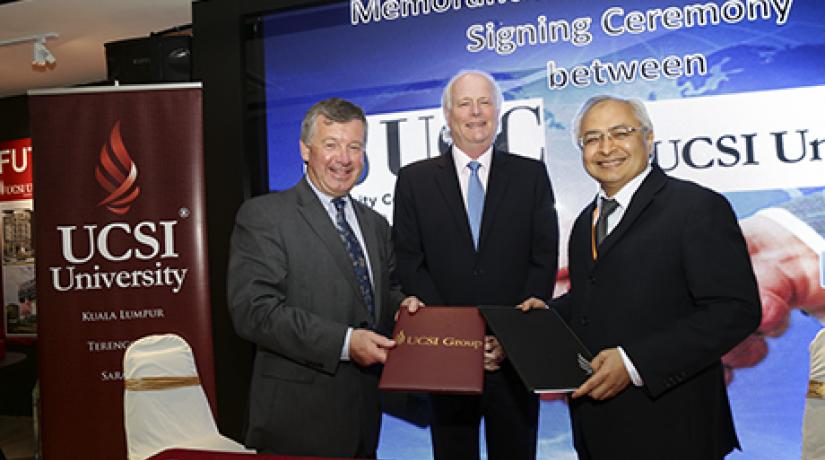  BEARING WITNESS: Exchanging of the MoU was witnessed by the Irish Ambassador, His Excellency Declan Kelly (middle).