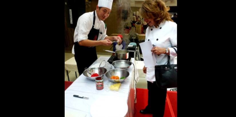SKILLED HANDS: A judge in the midst of assessing one of the participants' pasta skills