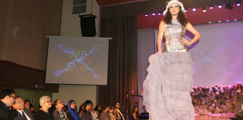 LAYERED TEXTURES: A model wearing fashion student Teh Boon Jean's head accessory and architecture inspired gown during the Graduation Show cum Art Exhibition.