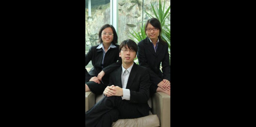  From left: Tan Ying Hua, Loo Hoe Fieh and Lim Bee Nee after their award-winning presentation.