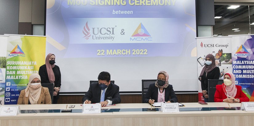 Dr Siti Hamisah (second,right) signed on behalf of UCSI Education Sdn Bhd, while Dr Fadhlullah (second,left) represented MCMC.