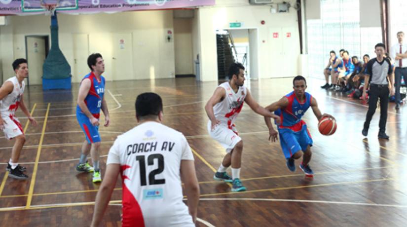 [DRIBBLING DRILLS]: UCSI's player Paul Effiong dribbling his way around the Dragons.