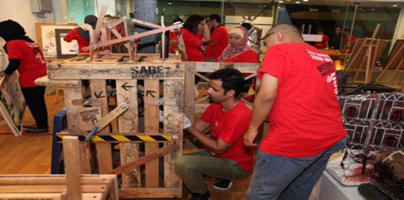  ASPIRING ARCHITECTS: UCSI’s Interior Architecture student Morteza Bozorgi – who is part of the team who bagged first place in the Installation Design category – doing a quick check on the structure after the 17th MIID Interior Design Competition.