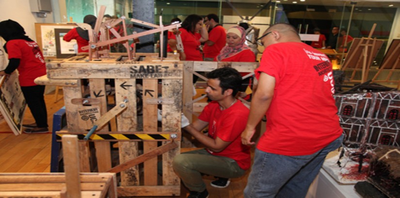  ASPIRING ARCHITECTS: UCSI’s Interior Architecture student Morteza Bozorgi – who is part of the team who bagged first place in the Installation Design category – doing a quick check on the structure after the 17th MIID Interior Design Competition.
