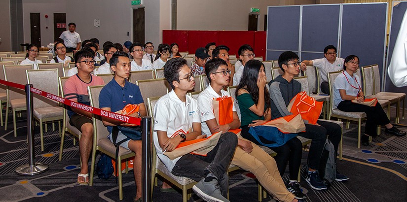 Students at the event listening to one of the talks.
