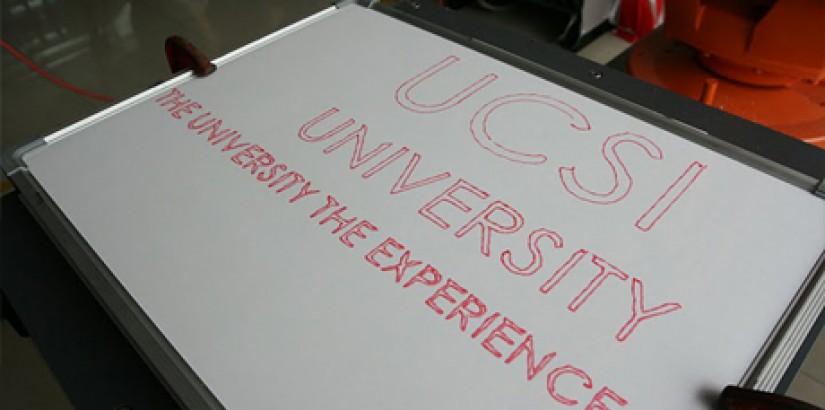 The students configure the machine to also write out “UCSI University, The University The Experience”