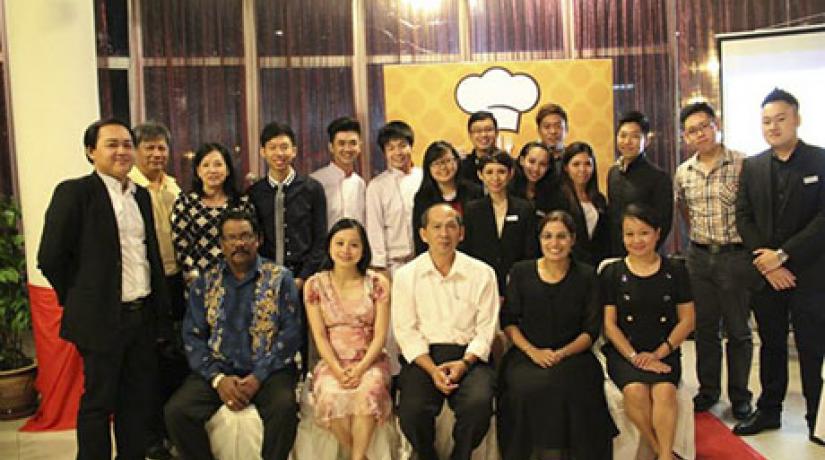  GROUP PORTRAIT: UCSI International Cuisine Charity Dinner 2014 committee members and sponsors posing for a group shot after the event.