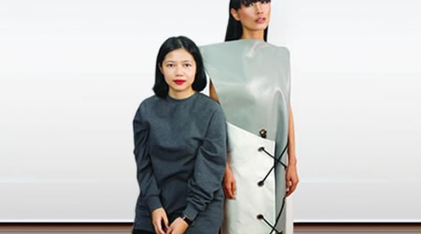 Lee Bao En (left) pictured with Malaysia's top model Amber Chia who is wearing one of Bao En's 10 designs showcased at the KL Fashion Week RTW 2016.
