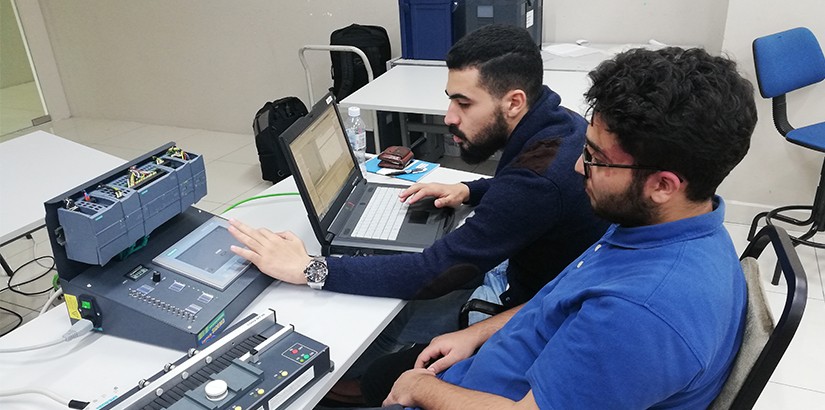 The participants working on the configurations for human machine interface (HMI).