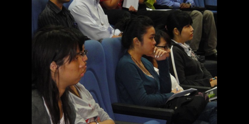  Participants listening attentively during the Forum
