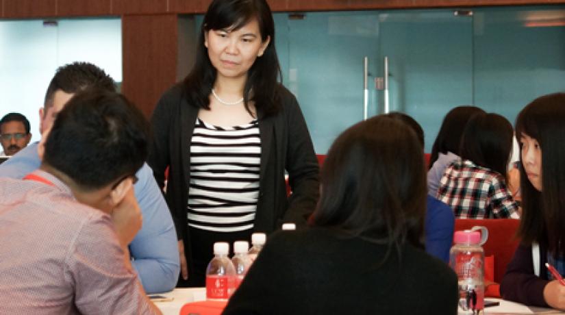 ENCOURAGING: Assoc Prof Dr Yeong, dean of the Faculty of Pharmaceutical Sciences listening to the undergraduate students as they share their research findings.