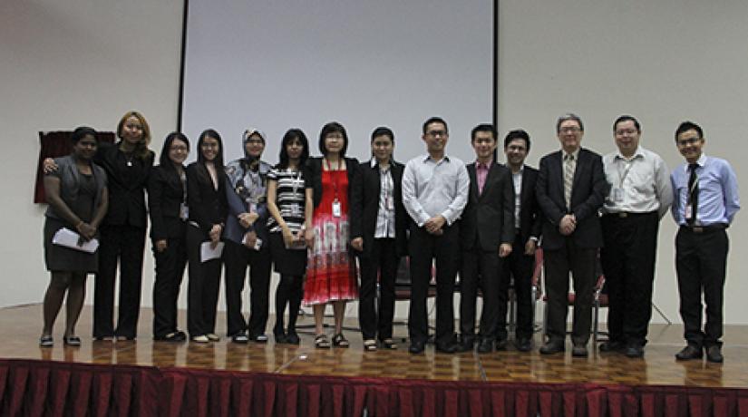  SUCCESSFUL EVENT: Staff of the Faculty of Business and Information Science, Prof Dr Teoh and speakers in a group photo session.