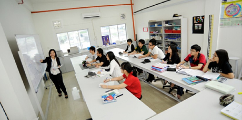  GCE A Level students listening intently during a face-to-face session with a Centre for Pre-U Studies Chemistry Lecturer