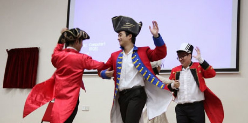  BRITISH DANCE: All dressed up as British soldiers, the students perform an English traditional country dance during the showcase.