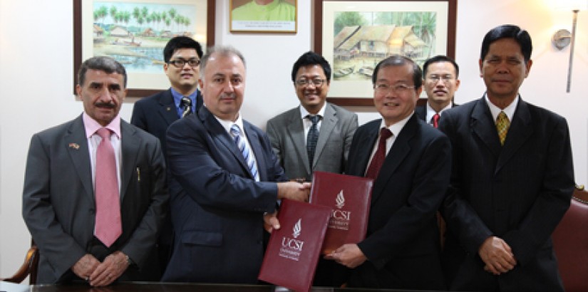  GULF PACT: Acting President of the University of Duhok Dr Luqman M. Salih exchanging MoUs with UCSI University Deputy Vice Chancellor (Academic Affairs and Research) Prof Emeritus Dr Lim Koon Ong while (from left) Head of the Postgraduate & Research Dept