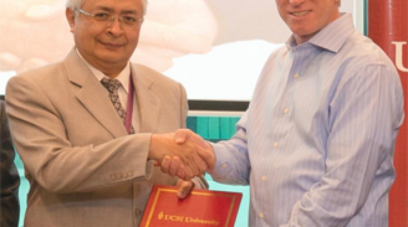 UCSI Vice-Chancellor and President, Senior Professor Dato’ Dr Khalid (left) receiving the software licenses donation on behalf of the University from Landmark Software Services Central Asia Country Manager, Addie Murray.