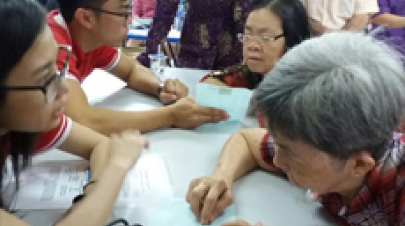 UCSI’s Associate Professor Dr Retneswari Masilamani (third from left) observes her students as they interpret the results of the screenings and provide counselling to their patients.