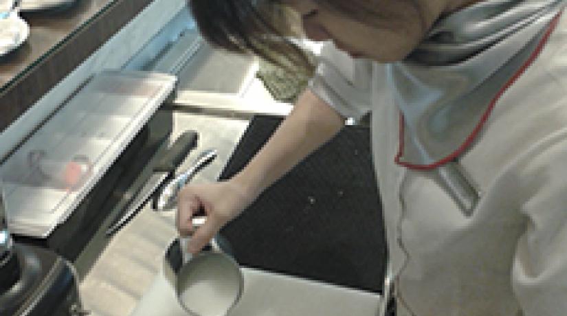  PRACTICE MAKES PERFECT: UCSI Hotel Management student Lim Yun Li preparing coffee for a customer at The Quad – an in-house restaurant at UCSI that provides FHTM students with the platform to put their theoretical knowledge to practice.