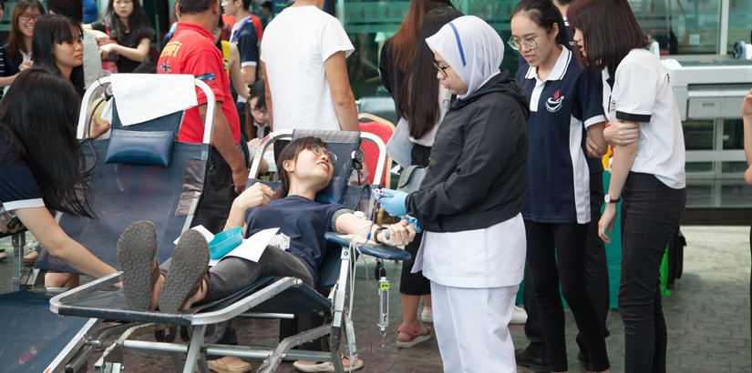 Showing support: One of the participants donating blood at the campaign.