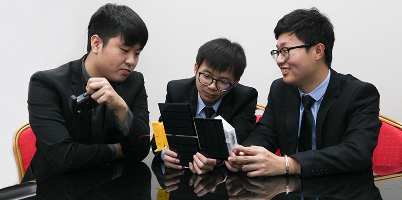  The three students with their winning Solar Car.