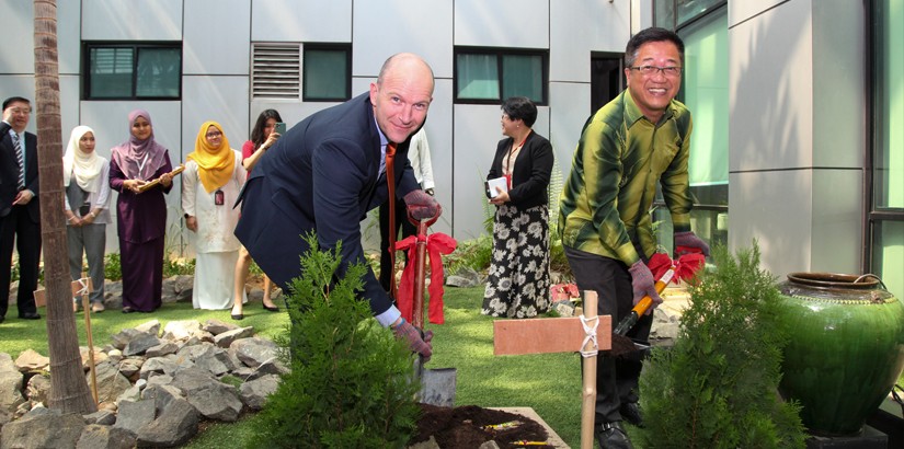 David (left) and Peter (right) completing the launching symbolic by planting 2 trees as a collaboration symbol between UCSI College and Oxford Brookes University.