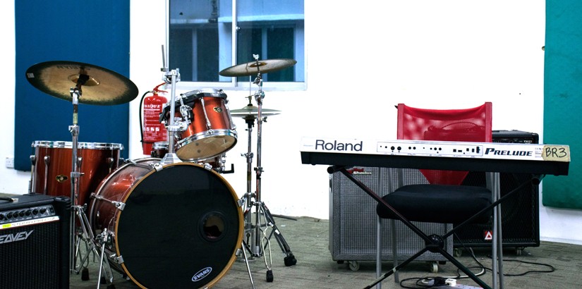 Various practice rooms for drums, guitars, bass for students