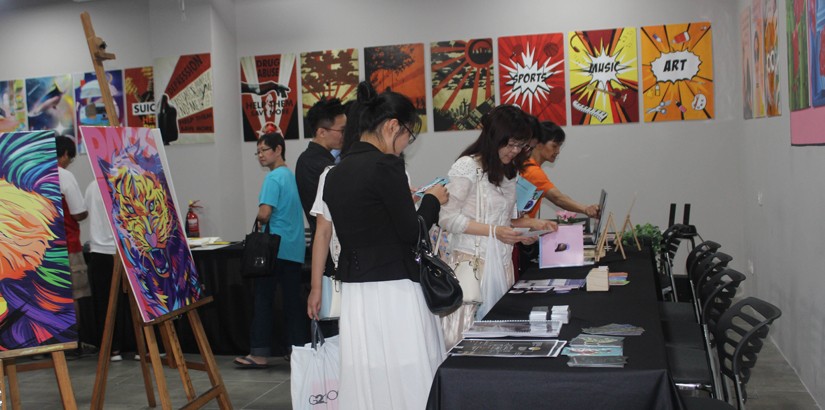 The public browsing through students’ artworks