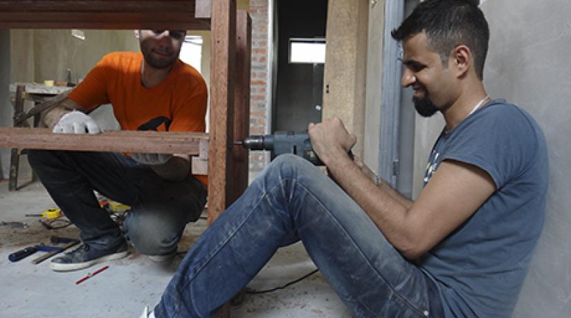  FOCUS (From right): UCSI students Morteza Bozorgi and Hesam Mirsafdari working on a table on-site.