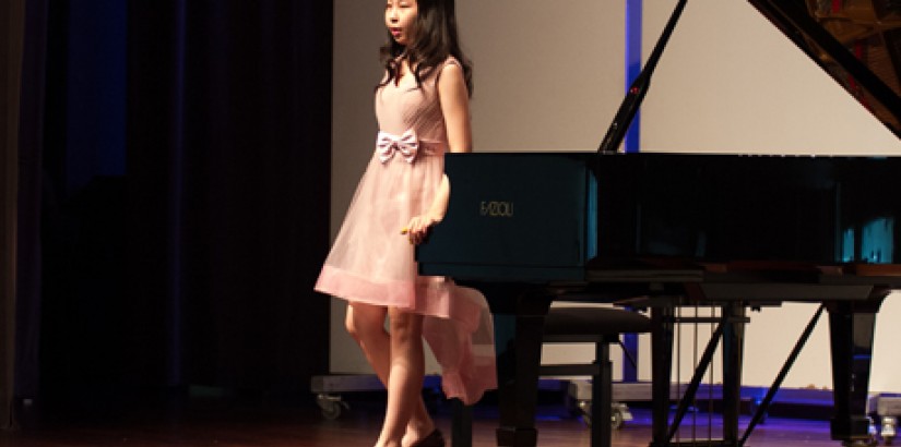 STUNNING: Clarissa Amanda from Indonesia, first prize winner in the Senior category, smiles at the audience before performing Liszt’s La Leggierezza from Three Concert Etudes.