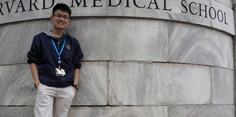 Nick stood proudly outside of Harvard Medical School.