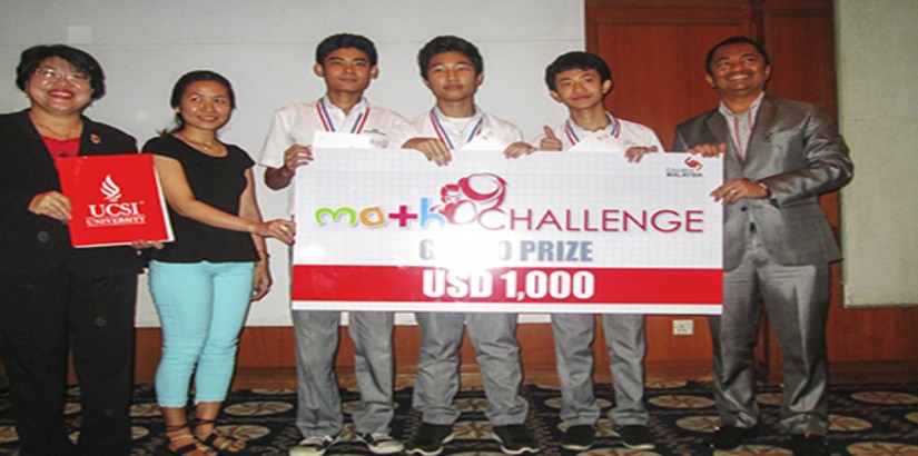 WINNERS (From left): UCSI Centre for Pre-U Studies Director Assistant Professor Mabel Tan (far left) and Education Malaysia Director Helmy Sulaiman (far right) presenting a mock cheque and certificates of participation to winners of the Maths Challenge.