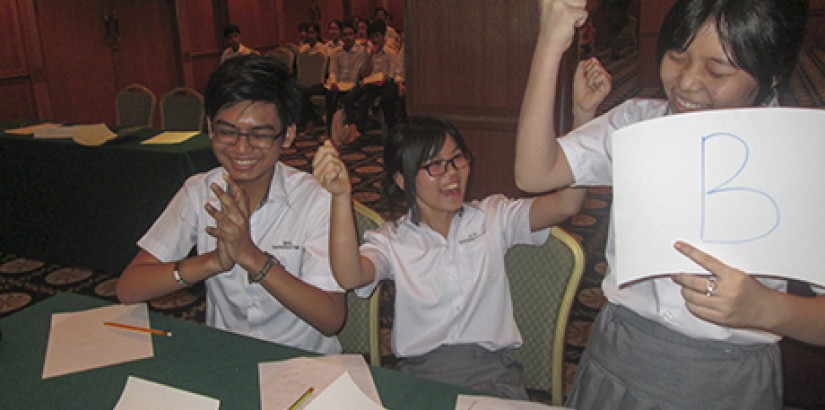  I GOT IT! Participants celebrating on getting the right answer during the Maths Challenge – a joint collaboration between UCSI, EMGS and REXPO that took place in Cambodia.