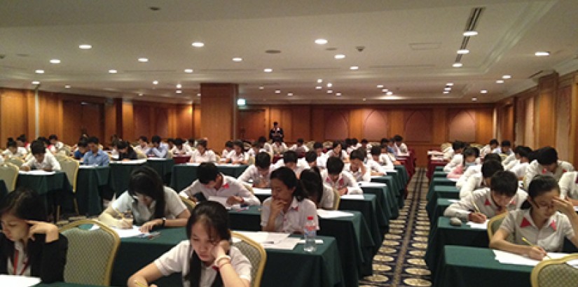 TOTAL FOCUS: Students engrossed in finding the right answers for the Maths Challenge – a joint collaboration between UCSI, EMGS and REXPO that took place in Cambodia.